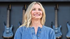 Cameron Diaz, smiling in a blue shirt