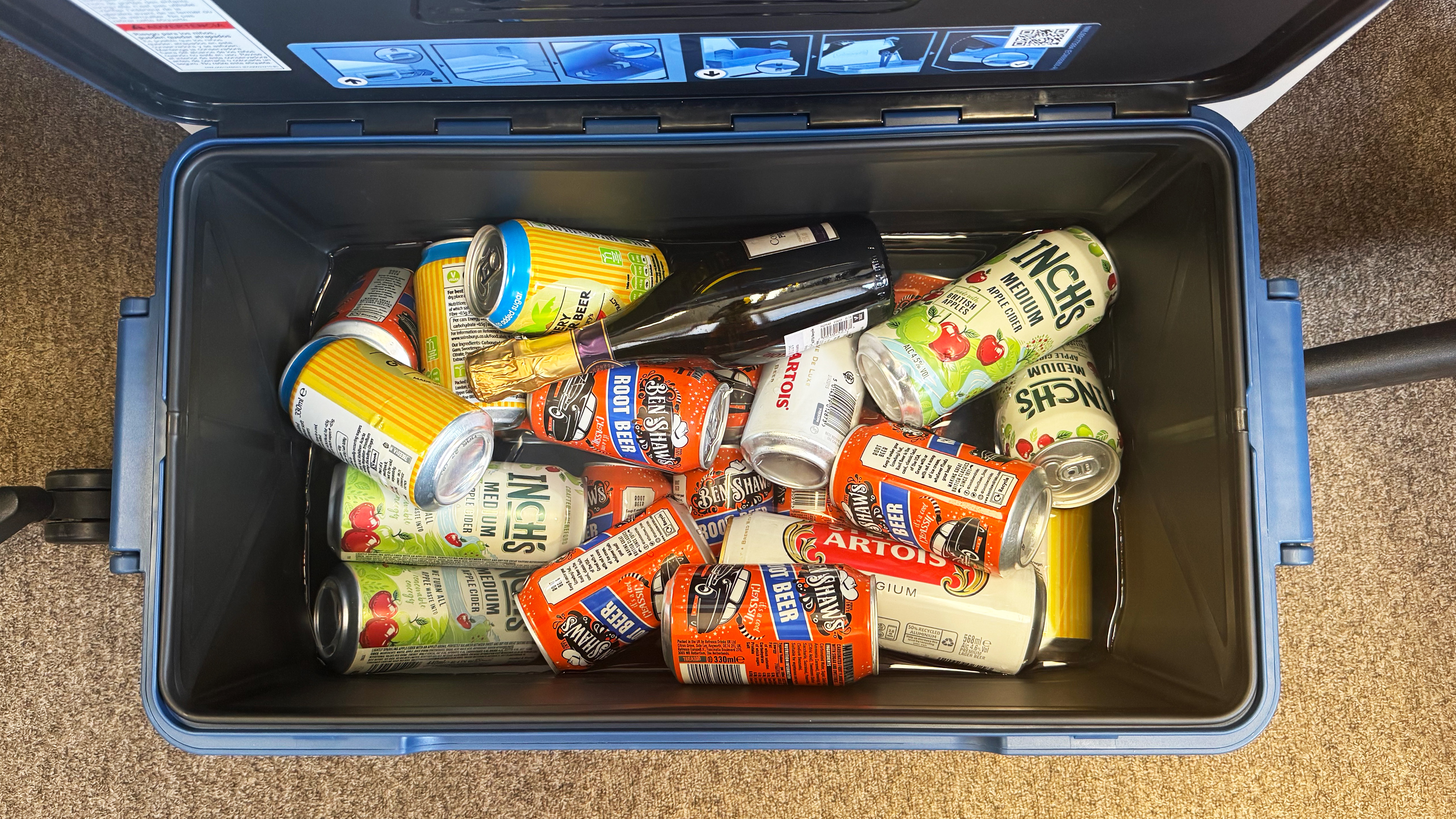 the coleman snap n go collapsible cooler with ice and cans