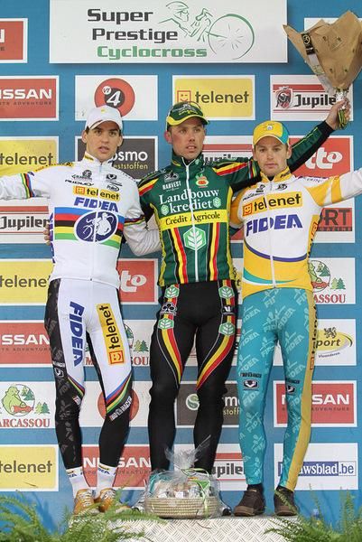 An elite elite men's podium, featuring Sven Nys on the top step.
