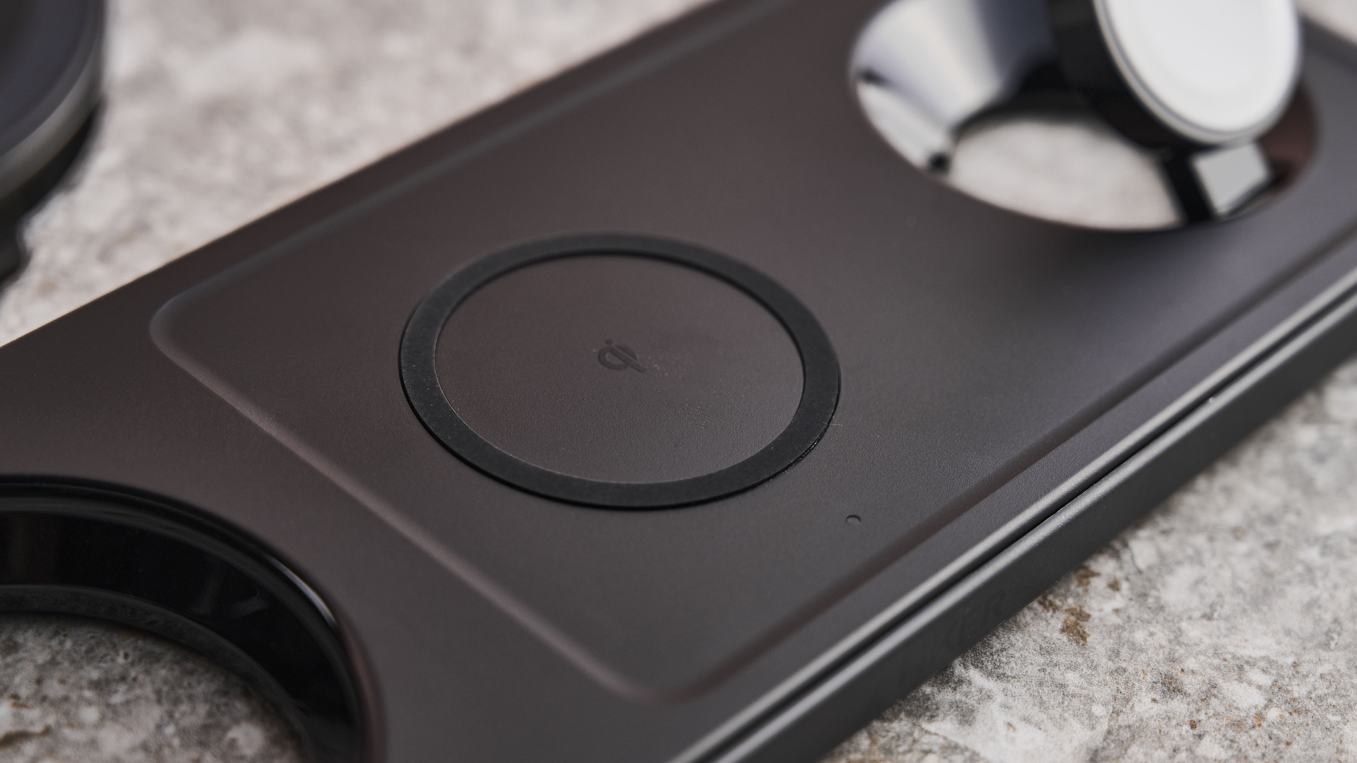 A close-up of the earbuds charging pad.