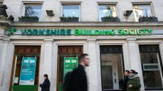 Yorkshire Building Society branch shopfront pictured in London, England, with pedestrians walking by in foreground.