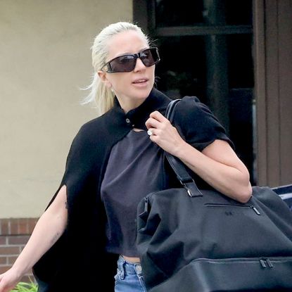 Lady Gaga carries a massive Beis bag and wears platform shoes and distressed jeans