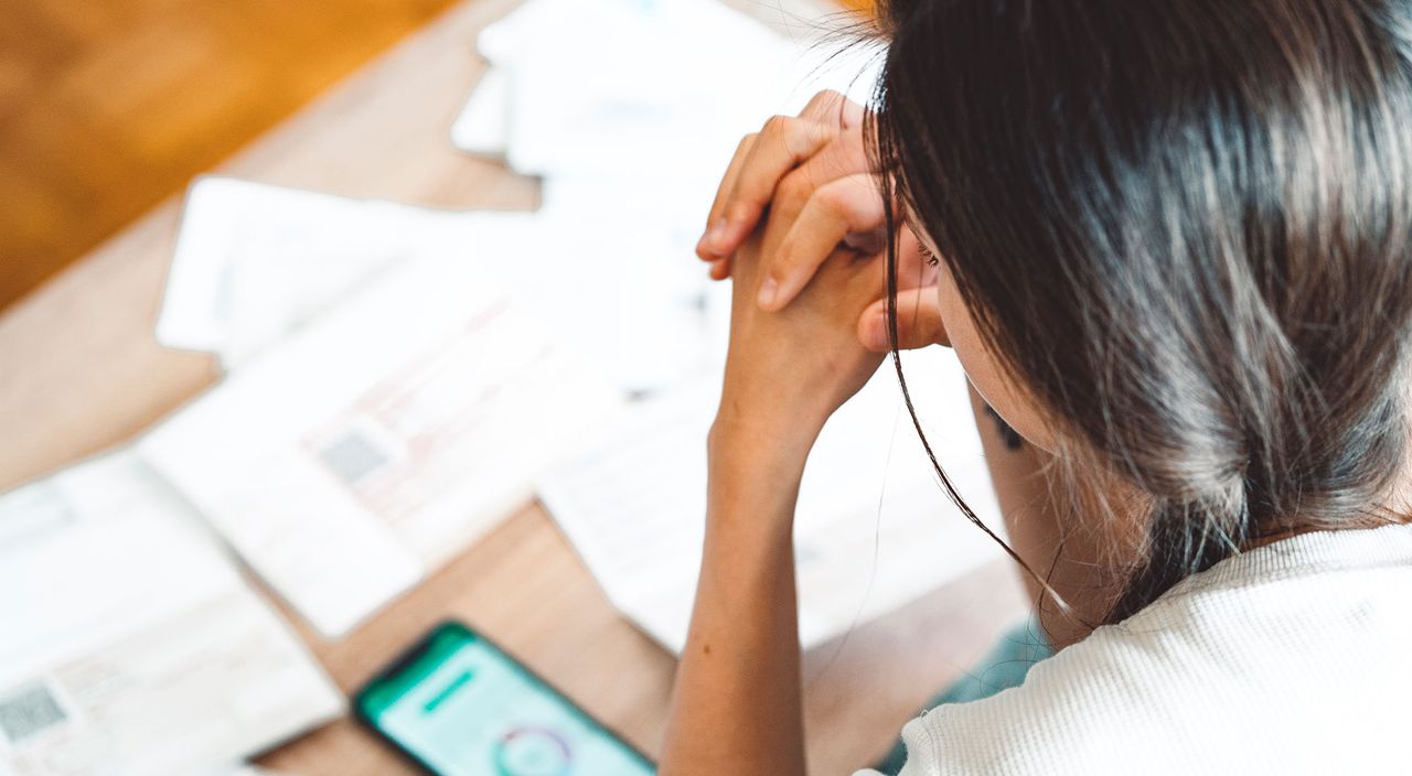 Woman worrying about her finances