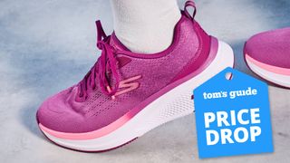 The Skechers Go Run Elevate 2.0 running shoes in the women's style, in fuchsia pink, photographed against a blue background.