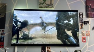 A dragon attacking soldiers in "House of the Dragon" on an LG G3 OLED TV.