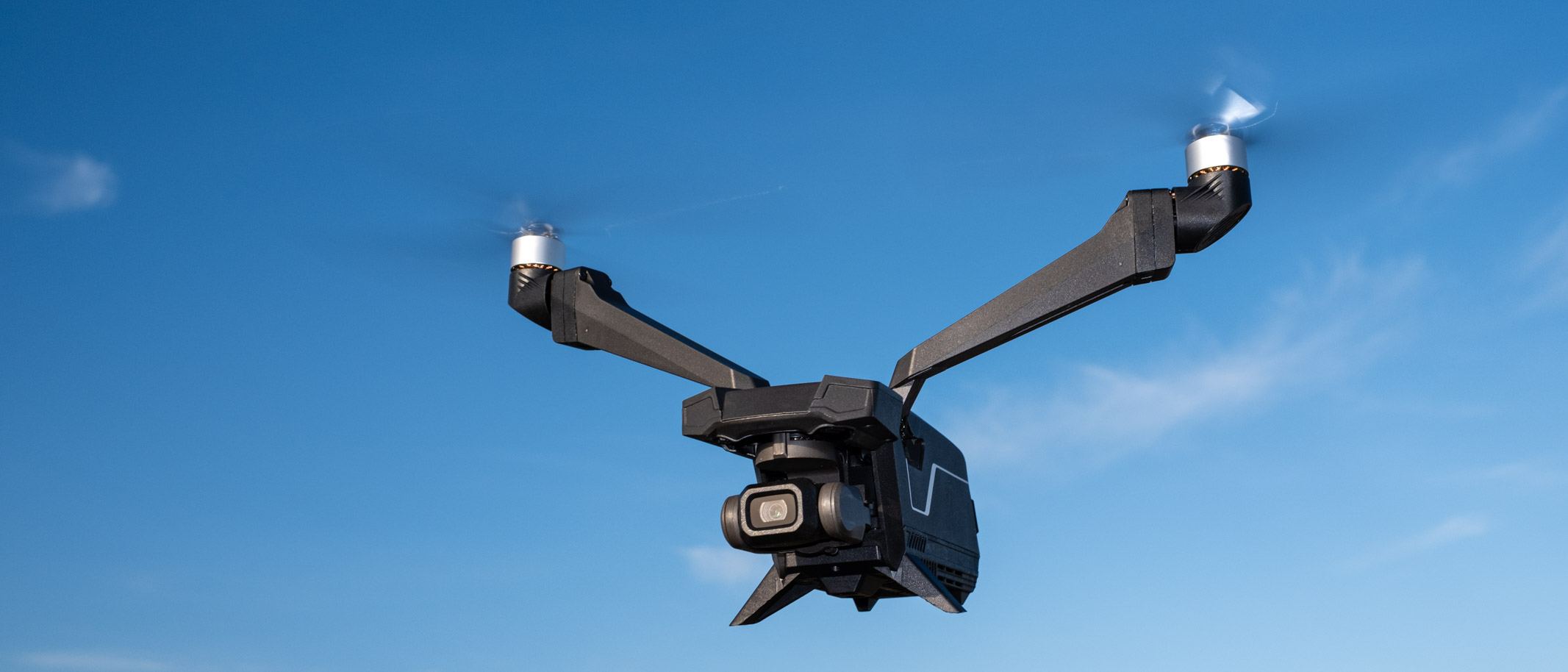 V-Copter Falcon Mini in flight against a blue sky