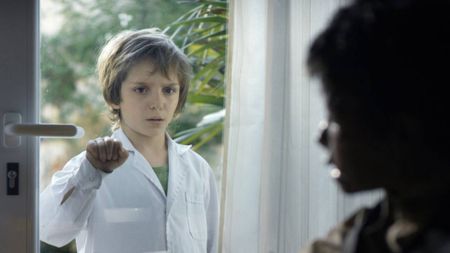 A little boy looking at his newly resurrected friend in Terrified