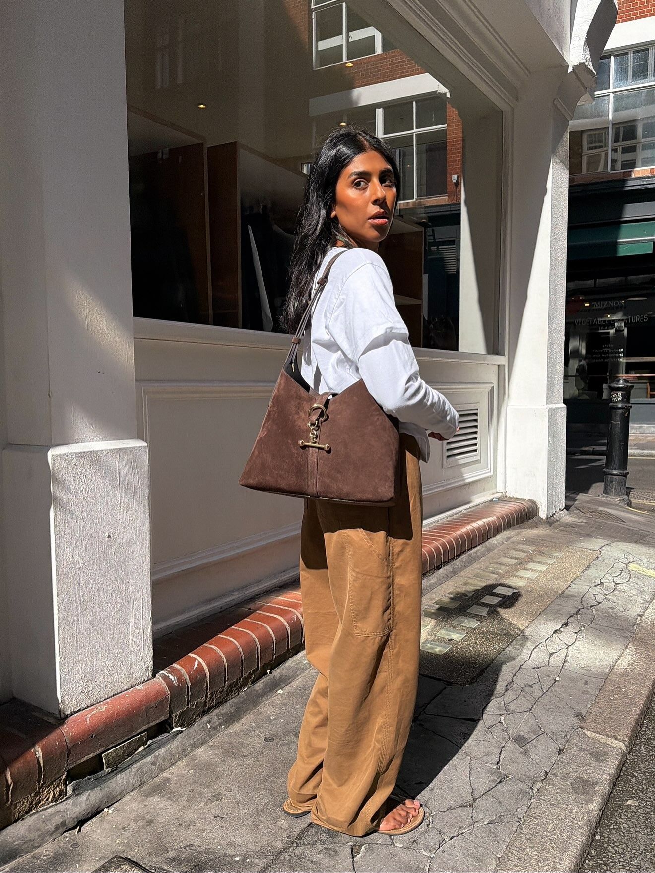 Woman wearing a fall outfit idea.