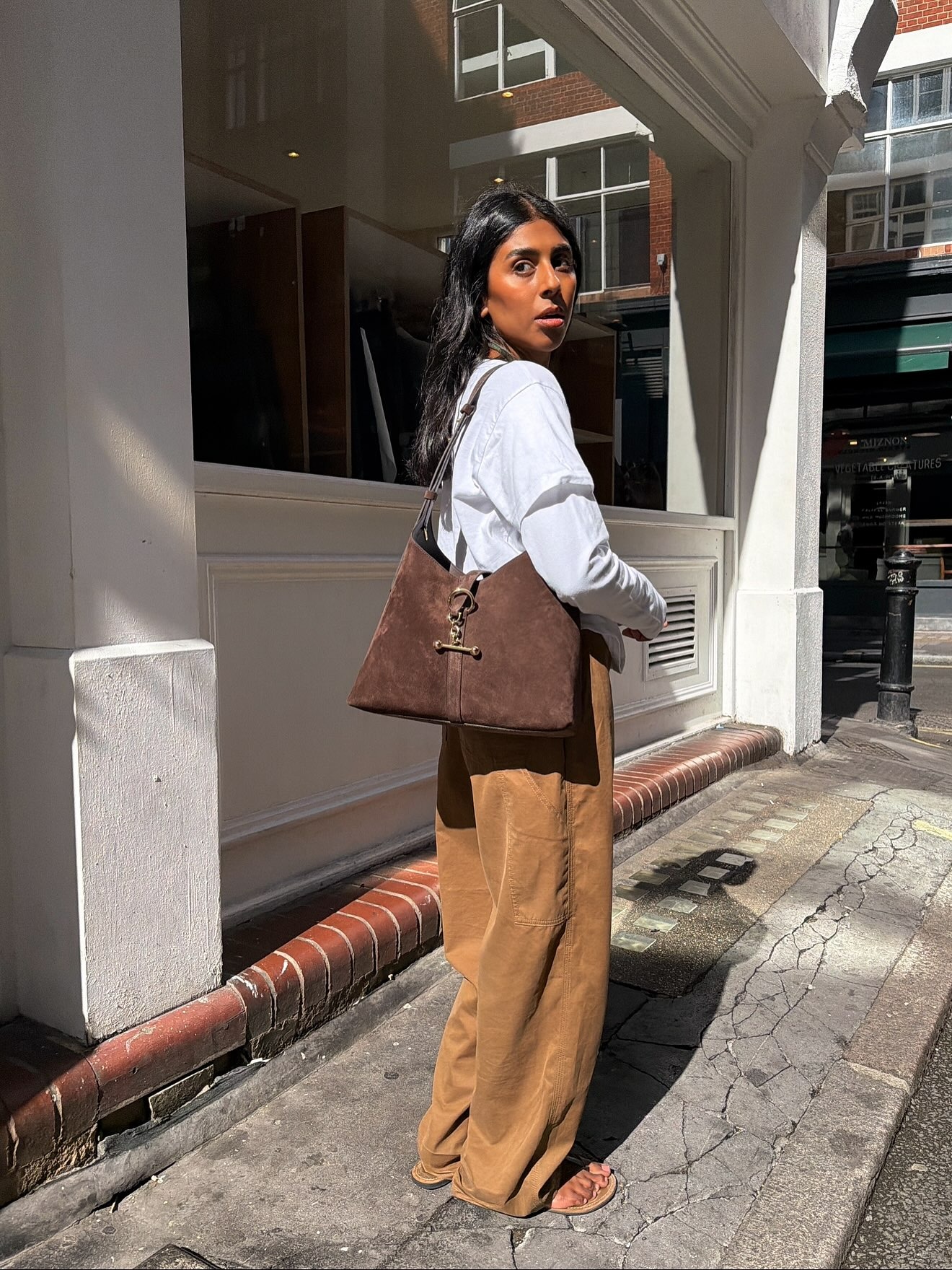 Woman wearing a fall outfit idea.
