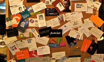 A business card wall: While online networking sites like LinkedIn threaten the humble business card, it remains a growth market.