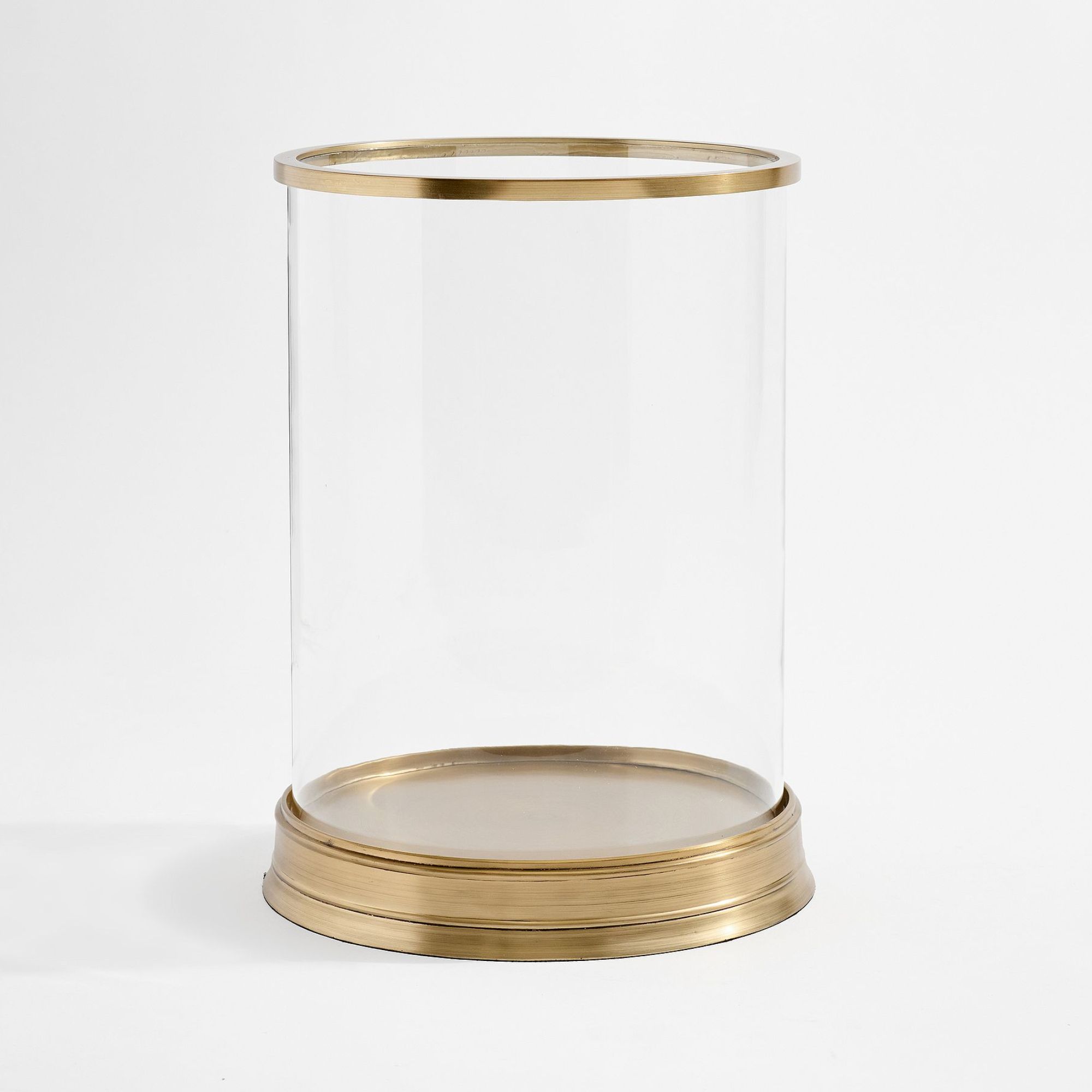 Glass hurricane holder with brass base and rim