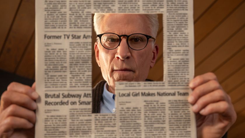 Charles looks through a cut out article in the news paper in A Man on the Inside.