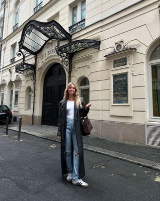 @_jeanettemadsen_ wearing jeans, leather trench and Sambas