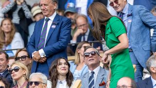 Catherine, Princess of Wales talking with Rachel Weisz and Daniel Craig in the Royal Box