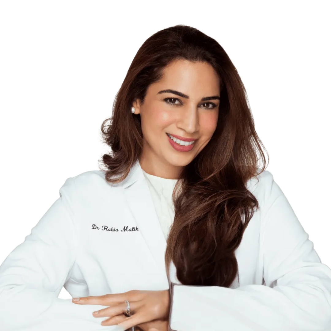 Image of Dr Rabia Malik smiling with curly long brunette hair