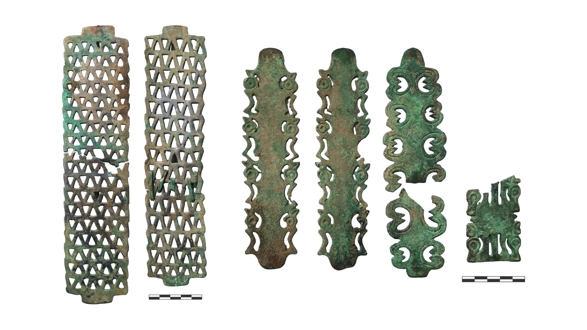 several rectangular bronze decorations