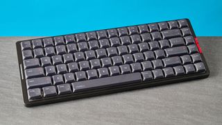 A black IQUNIX MQ80 mechanical keyboard