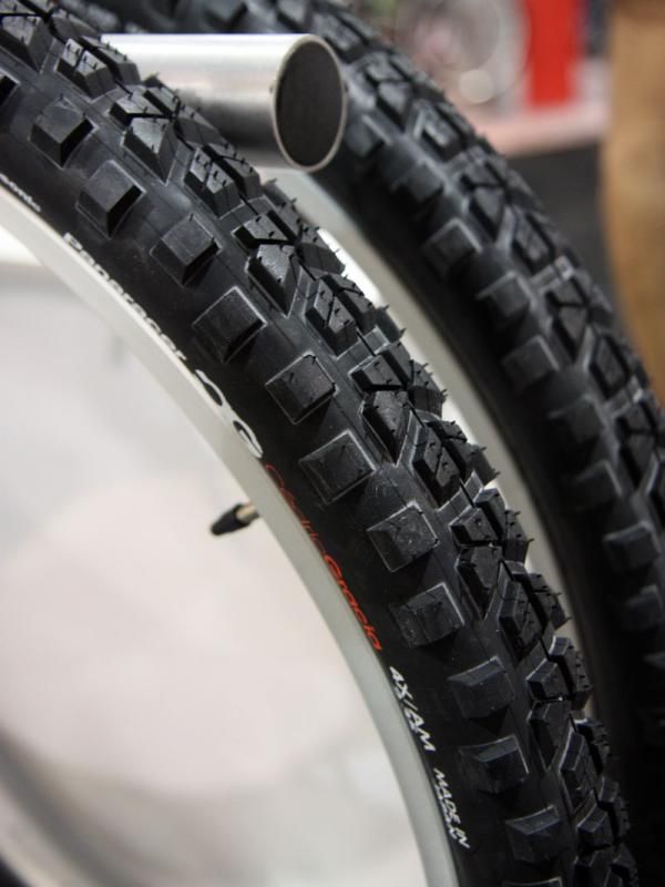 The Panaracer CG 4X/AM tires are designed for a fast roll when upright but a very aggressive grip when leaned hard into corners.