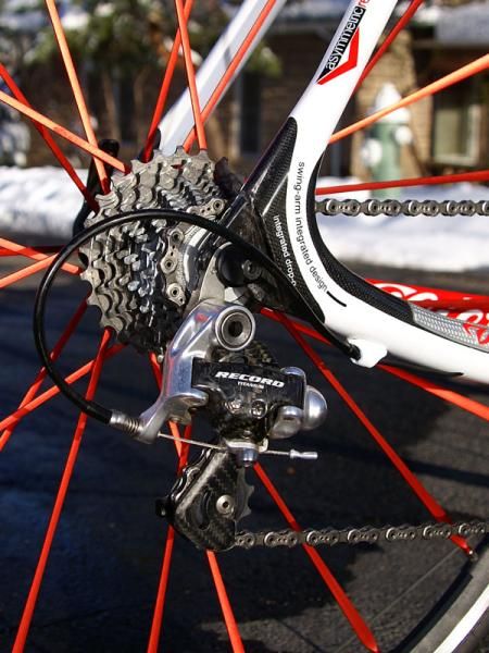 The Campagnolo Record 10s rear derailleur normally rattles off reliable shifts but the cable routing's additional drag made for sub-par gear changes
