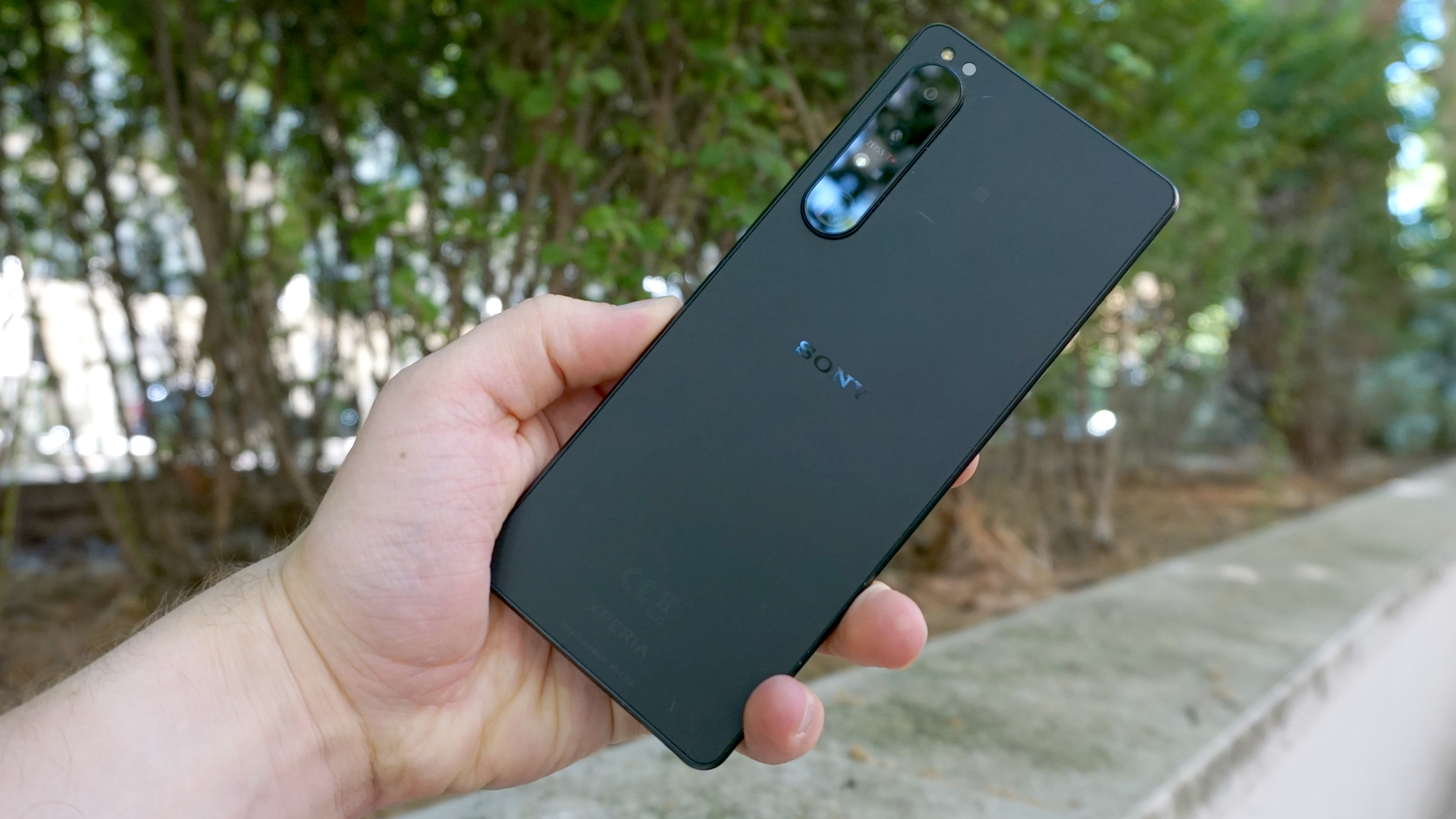 A Sony Xperia 1 IV seen from the back, in someone's hand