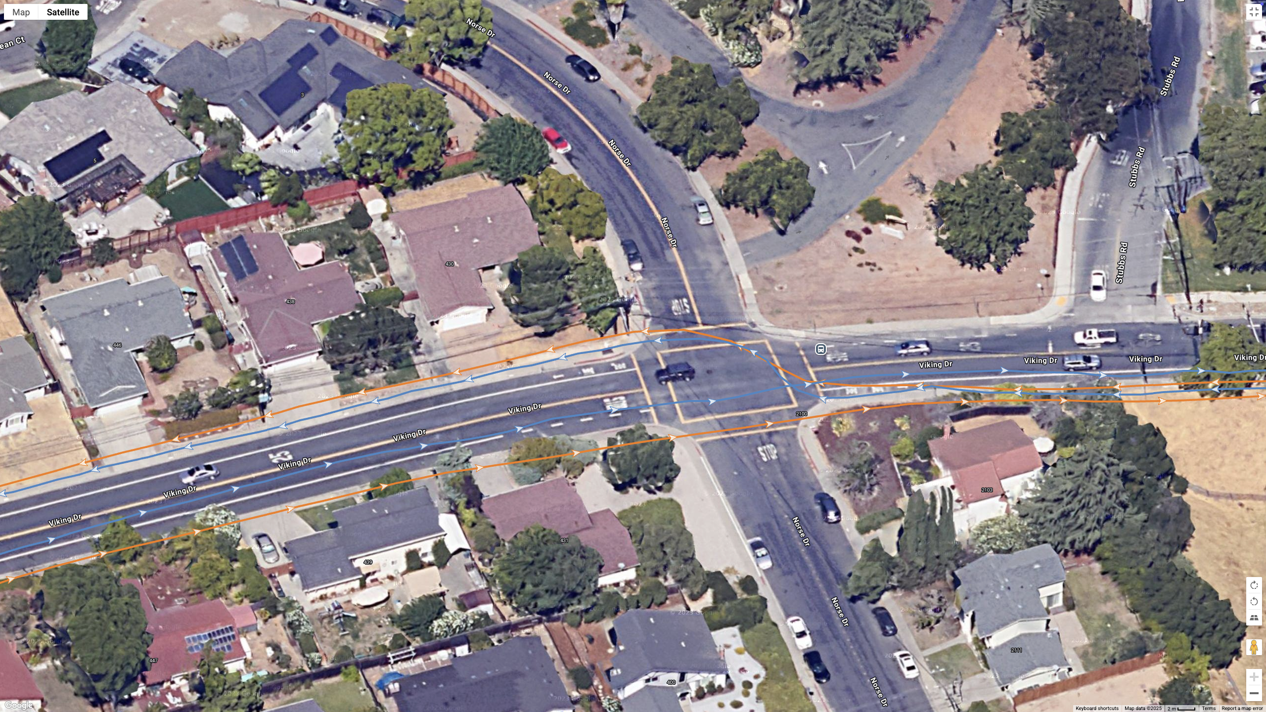 A Google Maps top-down view showing a GPS line for the COROS PACE Pro (orange) and Garmin Fenix 8 (blue)