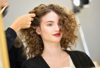 model with curly hair