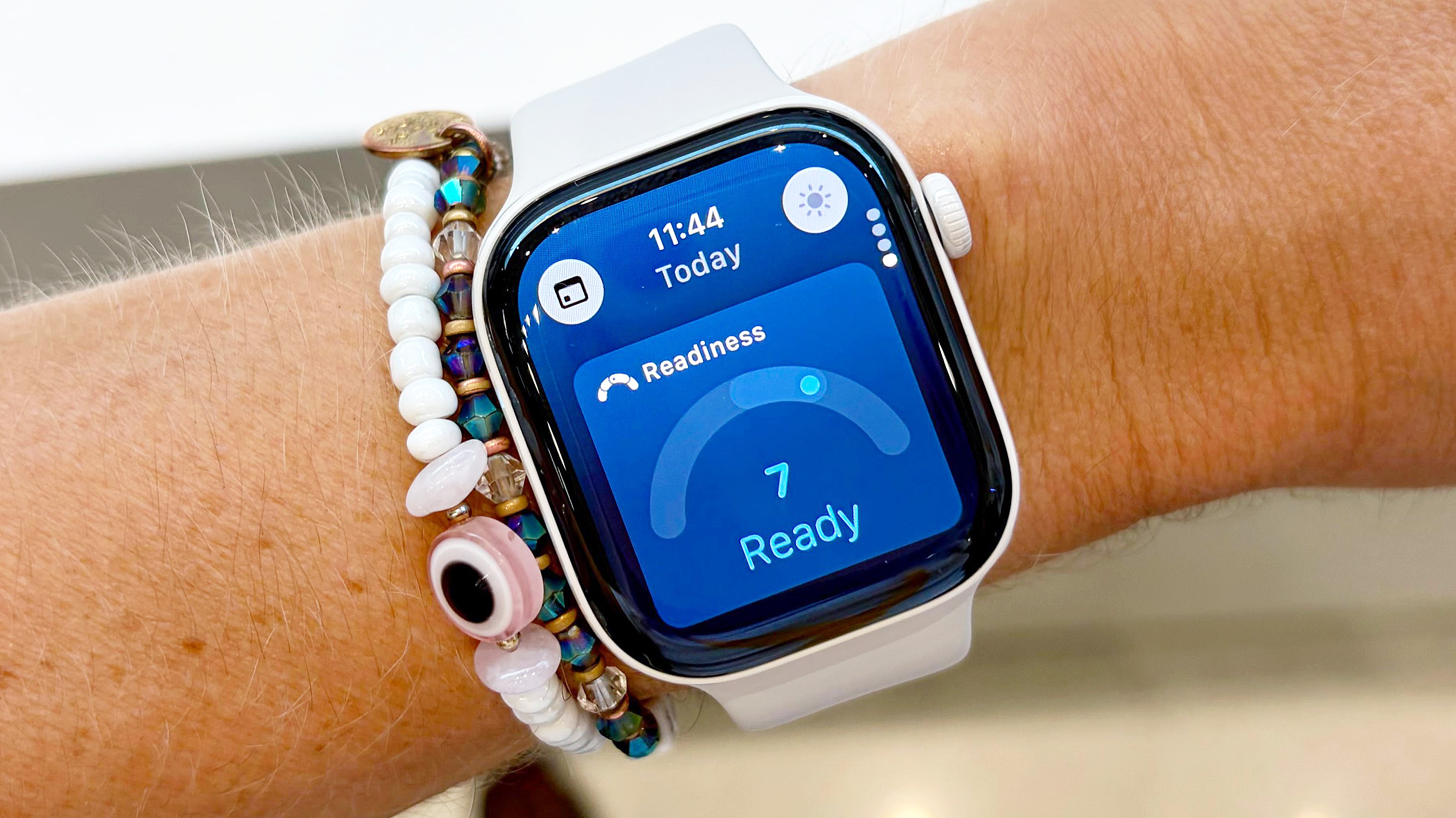 Close-up of the Apple Watch 12 on a user's wrist with the new dynamic Readiness Score shown