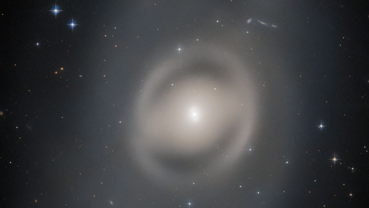 Hubble Telescope Captures A 'ghostly' Galaxy In Distant Space | Space