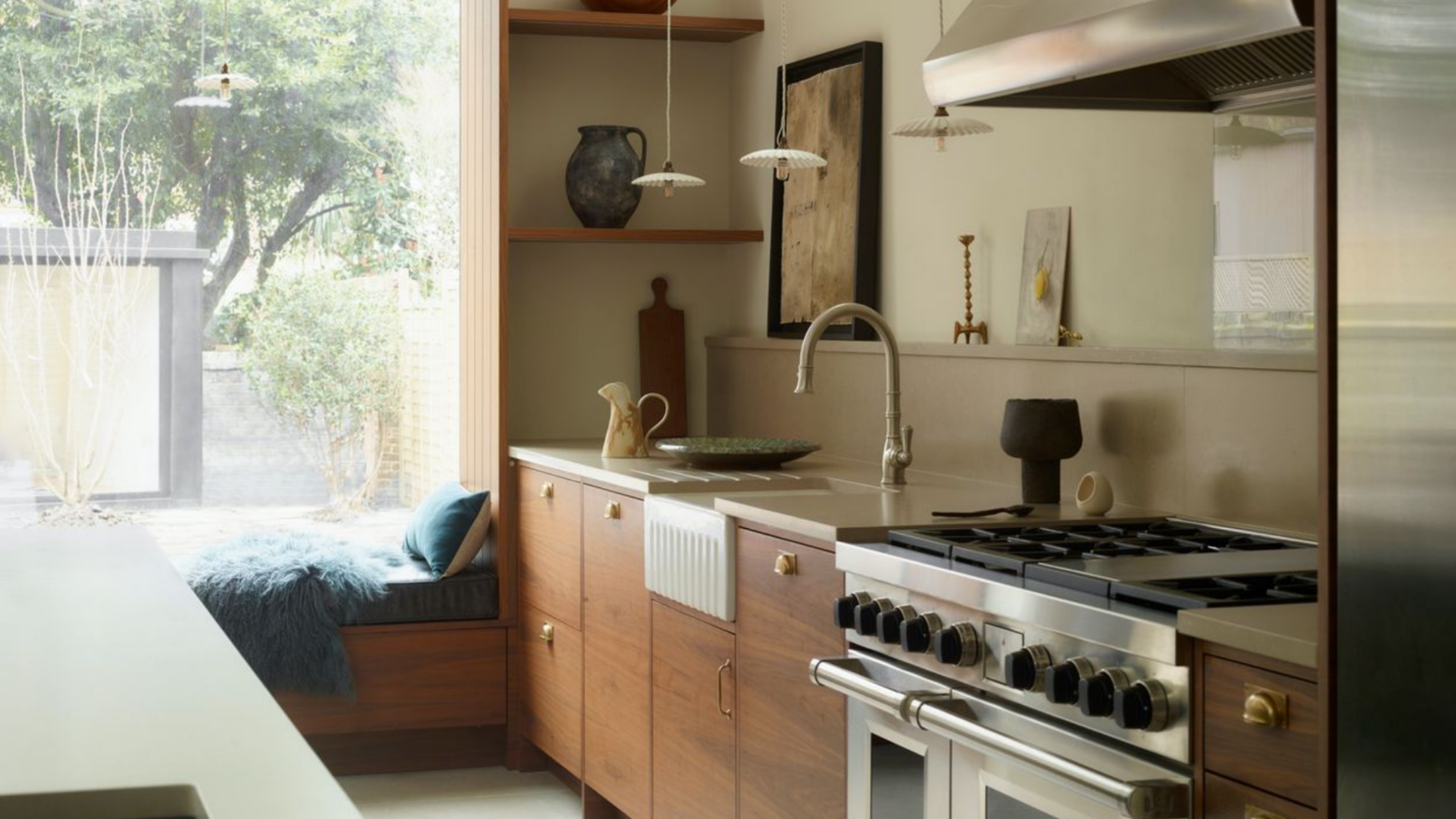 kitchen extension with window seat and wooden cabinets
