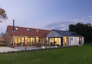 outdoor patio lighting on barn conversion and extension