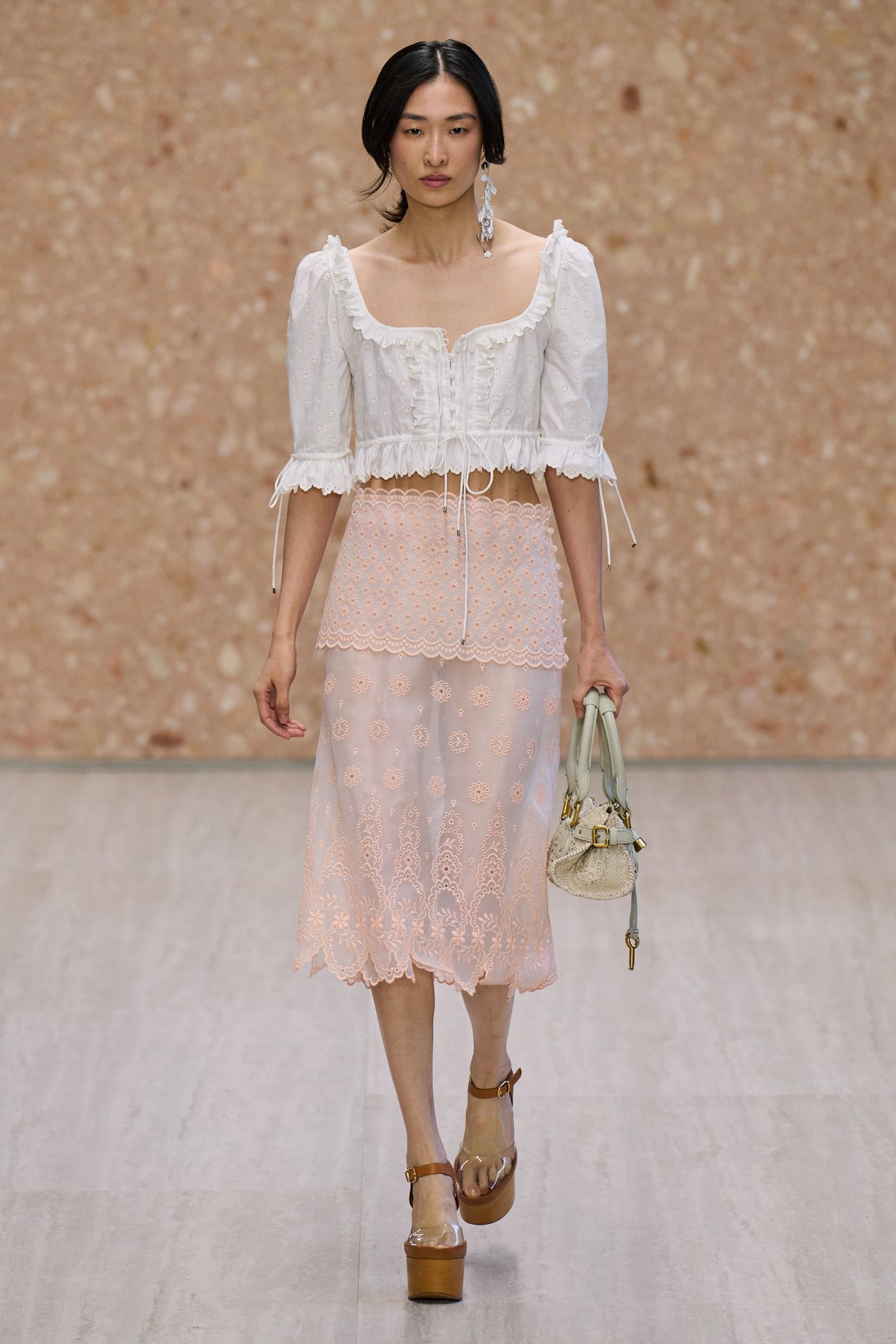A model walks the Chloé spring/summer 2027 runway during Paris Fashion Week.