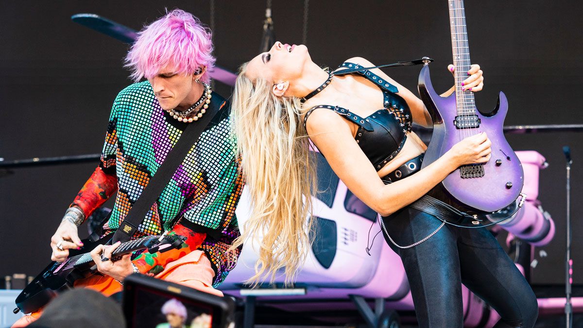 Machine Gun Kelly and Sophie Lloyd perform during 2022 Bonnaroo Music &amp; Arts Festival on June 19, 2022 in Manchester, Tennessee.