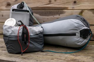 Tailfin Packing Cubes on bench