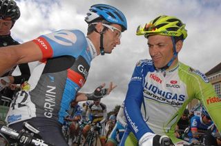 Second placed Nathan Hass (Garmin) with Ivan Basso (Liquigas) at the start