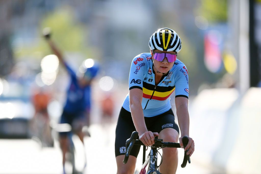 LEUVEN BELGIUM SEPTEMBER 25 Lotte Kopecky of Belgium crosses the finishing line during the 94th UCI Road World Championships 2021 Women Elite Road Race a 1577km race from Antwerp to Leuven flanders2021 on September 25 2021 in Leuven Belgium Photo by Tim de WaeleGetty Images