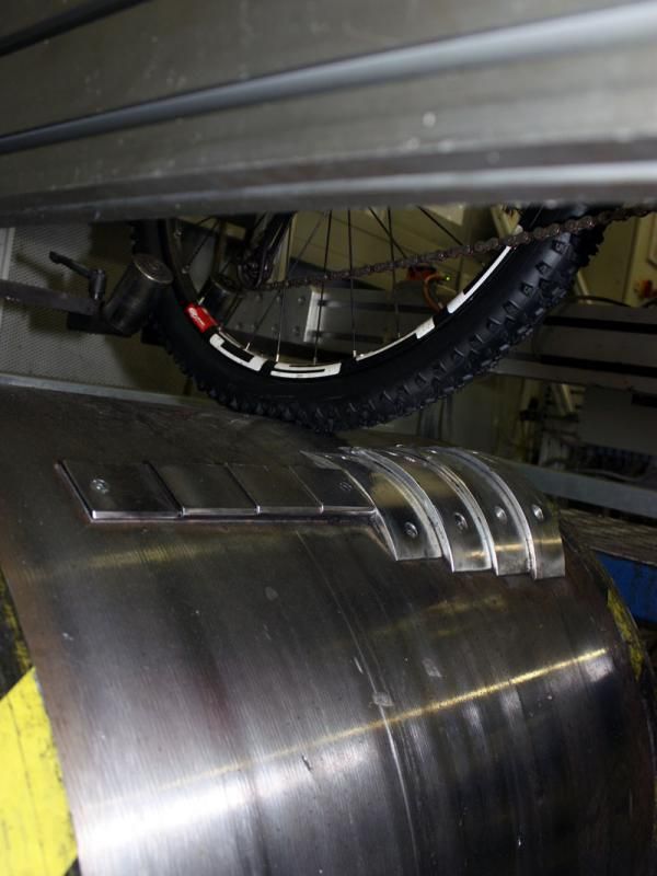 Different blocks on this giant drum roller allow Focus engineers to test the effects of various sizes of bumps.
