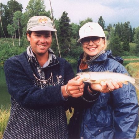 Hilary Clinton holding a fish