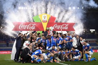 Napoli players celebrate their Coppa Italia final win over Juventus on penalties in June 2020.