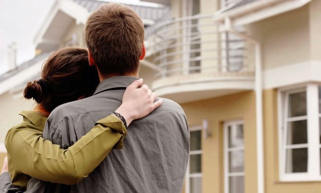 Couple looking at house