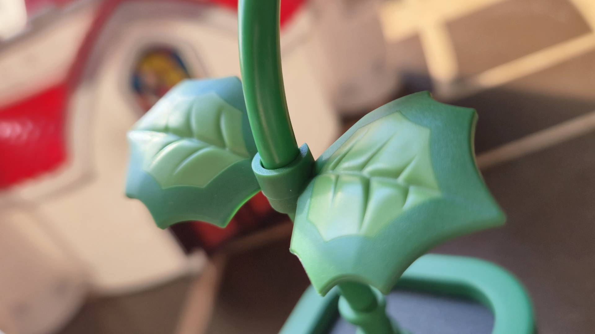 Photo by Rosalie Newcombe of a close up of the clip on leaf detail of the Hori Piranha Plant Switch 2 camera.