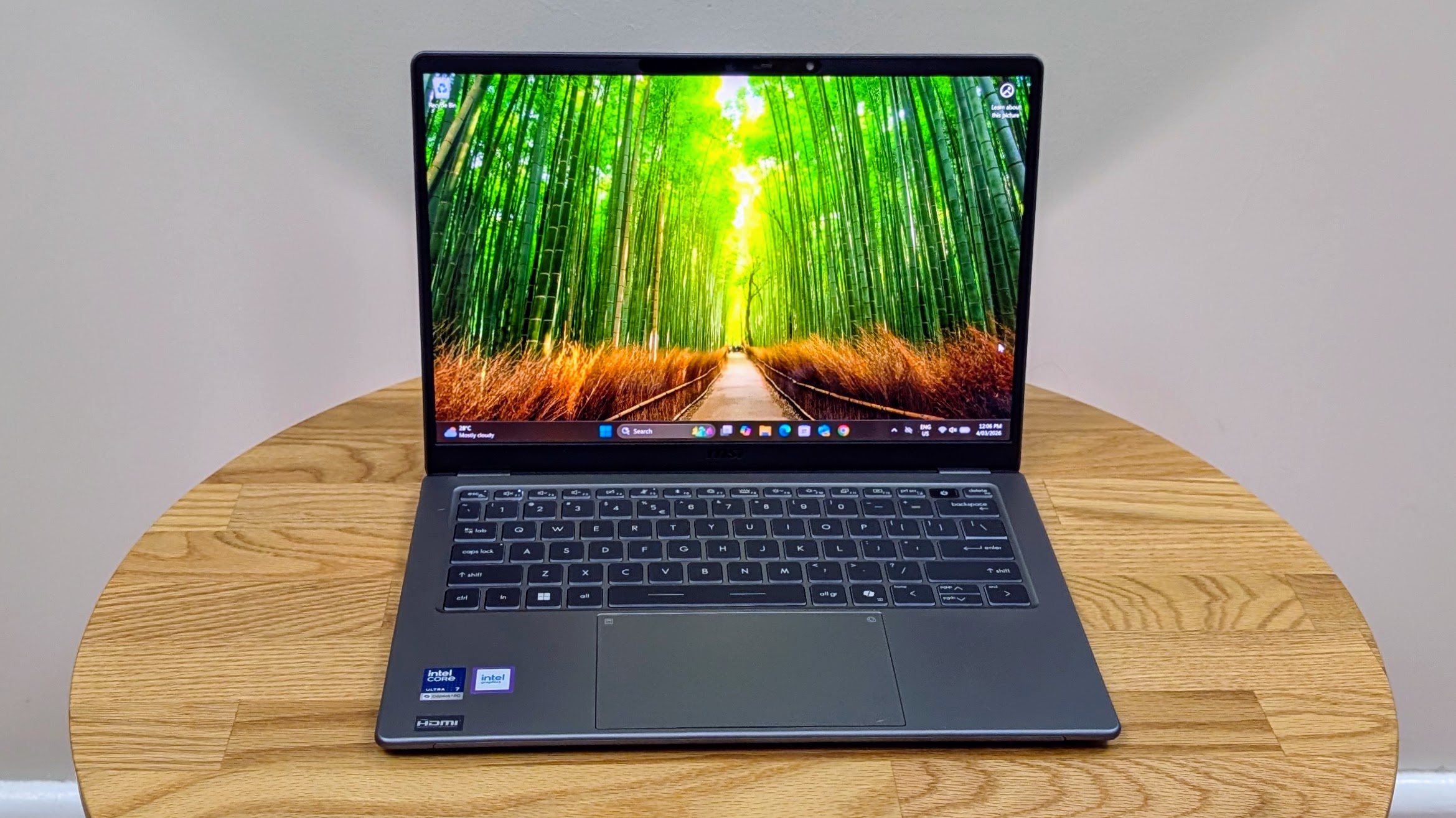 MSI Prestige 14 AI+ open on a coffee table