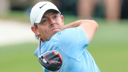 Rory McIlroy takes a shot during the first round of the 2023 Masters