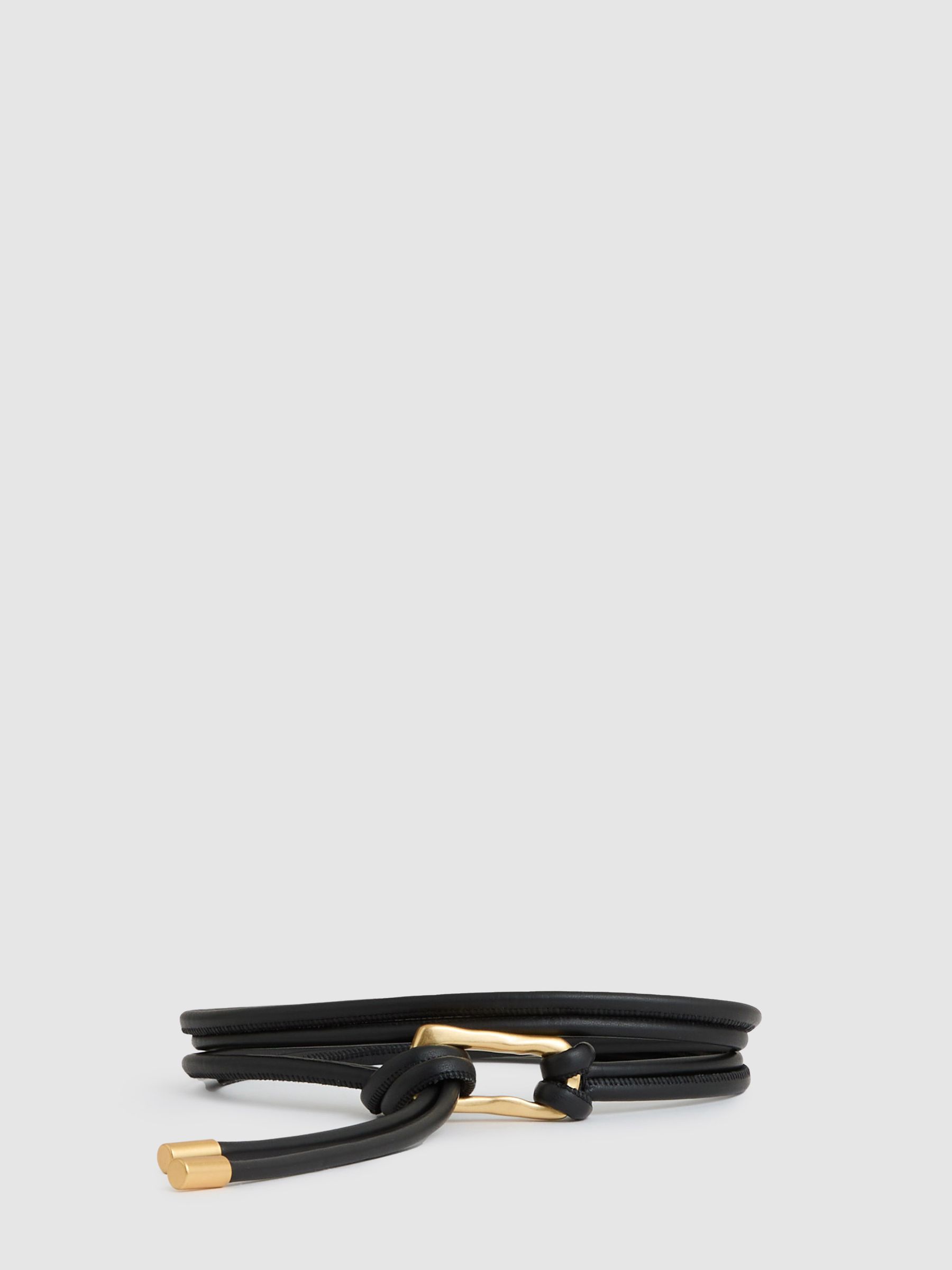 Sculpted Buckle Tubular Tie Belt in Black