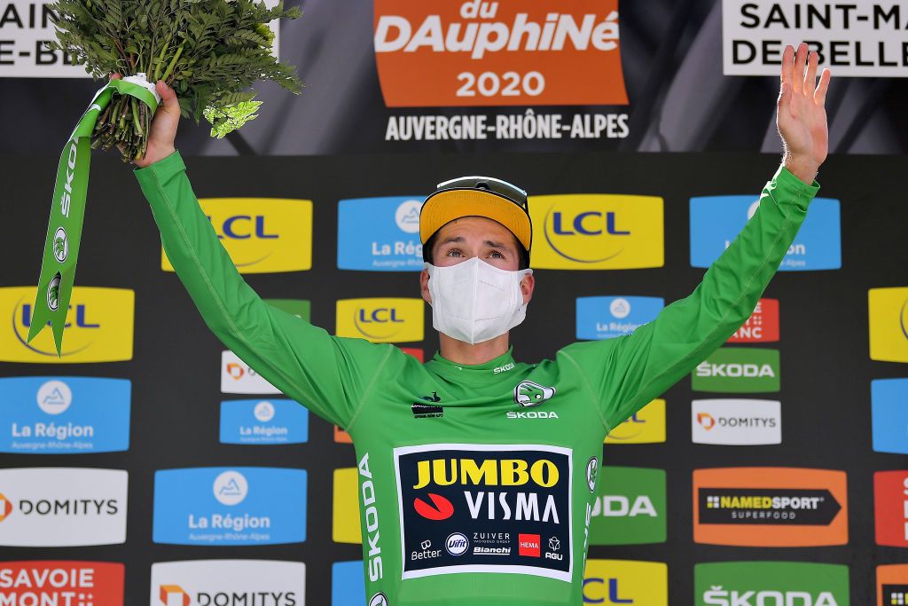 SAINT MARTIN DE BELLEVILLE FRANCE AUGUST 14 Podium Primoz Roglic of Slovenia and Team Jumbo Visma Green Points Jersey Celebration Flowers Covid safety measures during the 72nd Criterium du Dauphine 2020 Stage 3 a 157km stage from Corenc to Saint Martin de Belleville 1419m dauphine Dauphin on August 14 2020 in Saint Martin de Belleville France Photo by Justin SetterfieldGetty Images