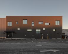 view of colourful and quirky Global Protection Corporation condom factory headquarters