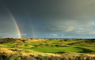 A rainbow forms behind the green on the 431 yards par 4, ninth hole 'Tavern' with the 418 yards par 4 15th hole 'Skerries' in the distance at Royal Portrush Golf Club the venue for The Open Championship 2019 on September 12, 2018 in Portrush, Northern Ireland. Phot: David Cannon/R&A via Getty Images