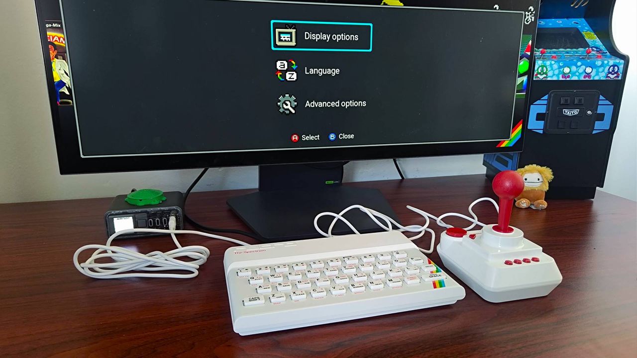 The Spectrum connected to LG OLED monitor with settings menu open.