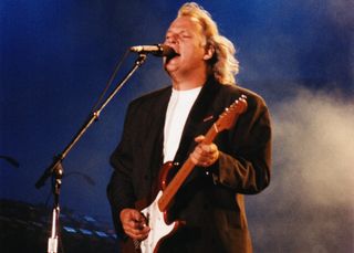 David Gilmour performs onstage with Pink Floyd at Knebworth '90 in Knebworth, Hertfordshire, England on June 30, 1990