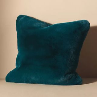 Fall throw pillow green teal fur on cream background