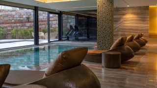 The indoor swimming pool and spa at Vila Foz